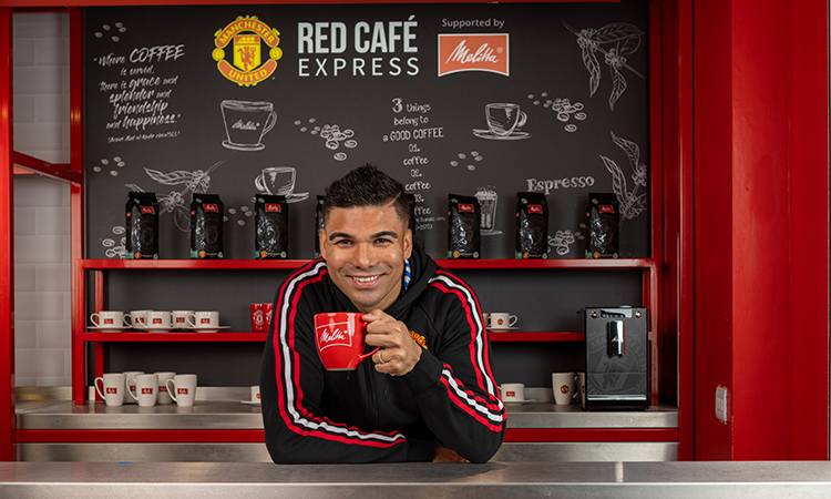 Spieler von Manchester United trinkt Melitta Kaffee